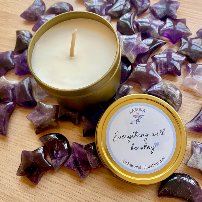 'Everything Will Be Okay' Candle with purple amethyst stars and moons surrounding it