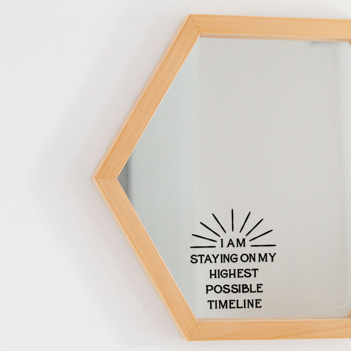 Mirror affirmation sticker that says "I am staying on my highest possible timeline"