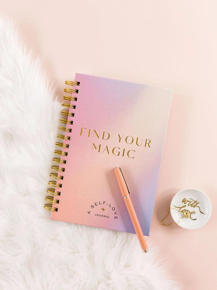 Self Love Journal. Cover says "Find Your Magic" and is pink and purple pastel colors.