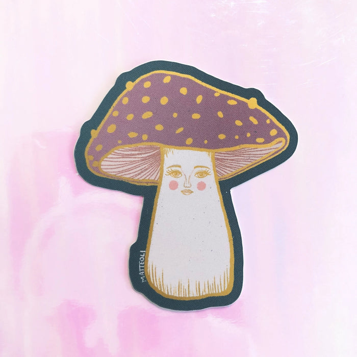 Vinyl mushroom sticker featuring original artwork with gold accents
